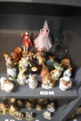 A large assortment of Beswick Pottery Beatrix Potter character studies to include 'Pig-Wig', '