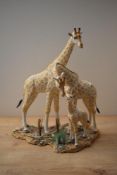 A large Country Artists Giraffe group 'Family Unit' model number CA06291, measuring 40cm tall.