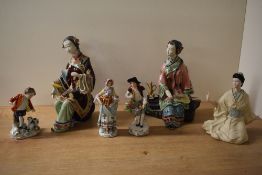 A group of three oriental figurines to include a Wedgwood porcelain Pearls of the Orient '