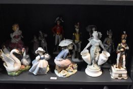 A miscellaneous selection of figures and figurines to include Nao by Lladro figurine 'Flowers from