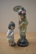 Two Lladro porcelain figurines comprising 'Oriental Lantern' model number 6231 and 'Oriental Spring'