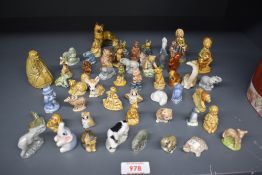 A selection of English Pottery Wade 'Whimsies' to include badger, elephant, lamb, racoon and lion