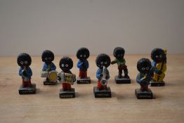 A group of eight vintage Robertson Jam band figures.