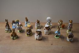 A group of fourteen Beswick Pottery Beatrix Potter character studies to include 'Old Mr