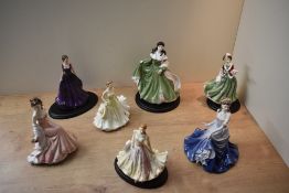 Two Royal Doulton bone china figurines Pretty Ladies 'Christmas Day' HN 4757 and 'Diane' HN 5723