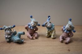A group of four Nao by Lladro porcelain clown figures to include 'Joy' model number 1067, '