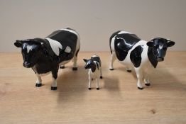 A Beswick Pottery Friesian Cow and Bull trio comprising Friesian Bull CH. 'Coddington Hilt Bar'