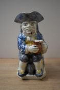 A Ralph Wood style Staffordshire pottery 'Prattware' Toby character jug circa 1800, depicted
