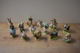 A group of thirteen Beswick Pottery and Royal Albert bone china Beatrix Potter character studies