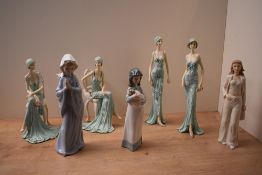 Two Nao by Lladro porcelain figurines 'Girl Praying' and 'Girl with Doll' sold together with a