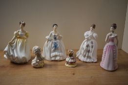 A group of three Royal Doulton bone china comprising 'Natalie' HN 3173, 'Kelly' HN 2478 and '