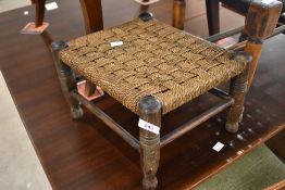 Two traditional strung footstools