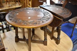 A pair of early to mid carved oak drop side gate leg occasional tables