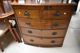 A 19th Century mahogany bow fronted chest of two over three drawers on bracket feet, dimensions