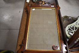 A 19th Century Chippendale style wall mirror (af) having gilt heightened decoration, approx. 78 x