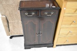 A reproduction Regency CD cabinet, dimensions approx. H80cm D24cm 50cm