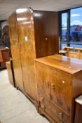 An early to mid 20th Century walnut three piece bedroom suite