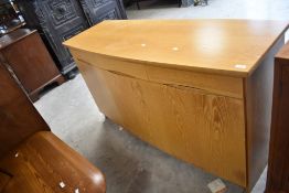 A modern beech sideboard of nice quality having bow front, some water stains to ends, dimensions