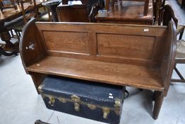 A traditional pitch pine pew, dimensions approx. W143.5 H89 D38cm