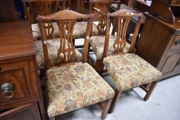 A set of six fine quality reproduction oak dining chairs in the Georgian style having Chippendale