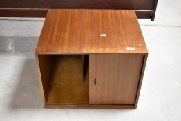 A vintage sapele record cabinet having sliding door, width approx. 50cm