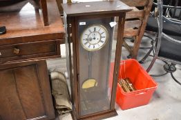 A 19th Century style wall clock in later case, having enamelled Roman numeral dial
