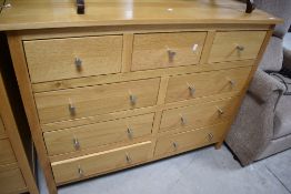 A modern Corndell Nimbus range light oak chest of three over six drawers. Dimensions approx. W117