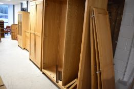 A modern Corndell Nimbus range light oak finish three door triple wardrobe, dimensions approx.