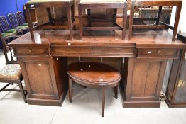 A 19th Century mahogany sideboard having ledge back frieze drawers on cupboard sections, width
