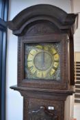 An 18th Century (circa 1730/35) carved oak cased longcase clock being 'The Wanslea Clock' by Jonas