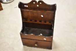 A period oak pipe or spoon rack having drawer to base, dimensions approx. H62 W39 D18 (small