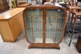 An Art Deco walnut china display cabinet, dimensions approx. W96cm H119cm D30cm