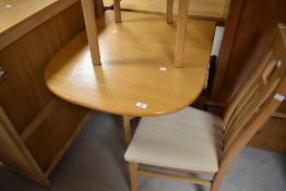 A modern Corndell Nimbus or similar range light oak finish Sutherland style drop leaf breakfast