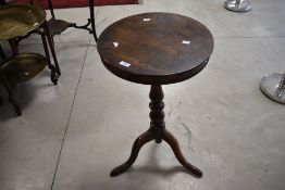 A 19th Century composite occasional having circular drum style top mounted on turned column with