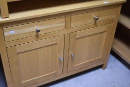 A modern Corndell Nimbus range light oak finish sideboard, dimensions approx. W100cm D42 H74cm