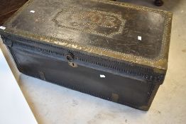 A vintage shipping trunk having studwork decoration, approx dimensions. 91cm x 47cm x 41cm