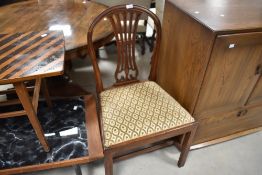 A late 19th or early 20th Century mahogany slat back dining chair