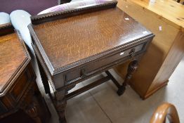 An early to mid 20th Century oak hall table having frieze drawer, width approx. 69cm