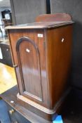 A Victorian mahogany pot cupboard having ledge back, dimensions approx. H80 W42 D39cm