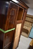 An Edwardian mahogany 'mirror' (no glass could be replaced with mirror or fabric) door wardrobe, and