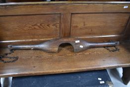 An antique wooden milkmaid's yoke, width approx. 101cm , width chains and hooks attached (no pails)
