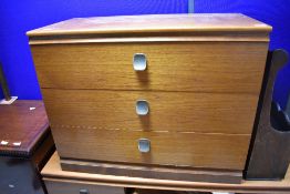 A selection of vintage Meredew Avalon teak style bedroom furniture comprising dressing table, two