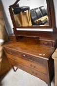 An Edwardian mahogany and inlaid dressing table on square tapered legs, width approx. 114cm