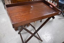 A late 19th or early 20th Century mahogany butlers tray on stand, approx. 81 x 51cm
