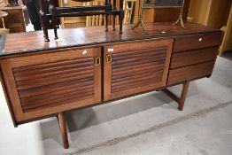 A vintage fruit wood (possibly Cherry) sideboard , having double cupboard and tripe drawers,
