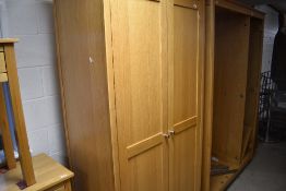 A modern Corndell Nimbus range light oak finish two door double wardrobe, dimensions approx. H209
