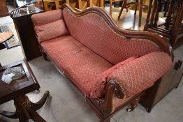 A Victorian mahogany chaise longue
