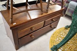A 19th Century mahogany low chest of two short over one long drawer, probably converted from