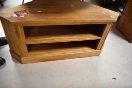 A modern golden oak corner TV unit, width approx. 106cm