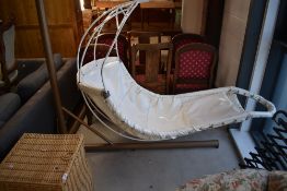 A vintage 'leaf' style hanging chair , with metal frame